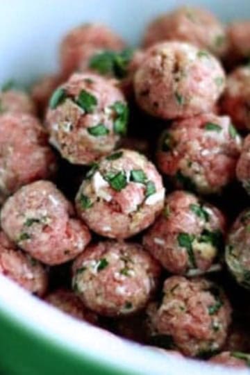 italian romano mini meatballs in a pyrex bowl