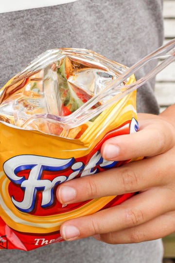 walking taco in a fritos bag with a plastic fork