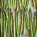 roasted Asian asparagus on a baking sheet