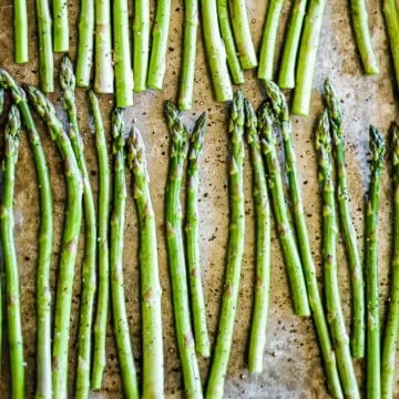 roasted Asian asparagus on a baking sheet
