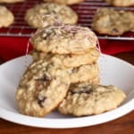 grandma's old fashioned oatmeal cookies stacked on a white ceramic plate