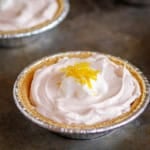 pink lemonade kool aid pie topped with lemon zest