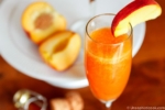 Frozen Peach Bellini Recipe -- this beautiful peach bellini recipe is the perfect fresh and fruity cocktail for sipping on a warm summer evening!