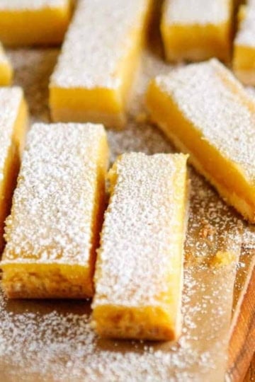 classic cut lemon bars dusted with powdered sugar