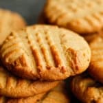 a pile of crunchy peanut butter cookies