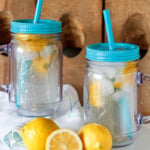 lemon shake ups in plastic mason jar cups with fresh lemons