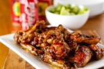 Coca-Cola Baked Chicken Wings -- don’t miss these crispy baked chicken wings smothered in a delicious sweet and tangy sauce made with Coca-Cola… PERFECT for game day and beyond! | oven baked chicken wings | best coca cola chicken recipe | baked coca cola chicken wings | coca cola chicken wings recipe | find the recipe on unsophisticook.com