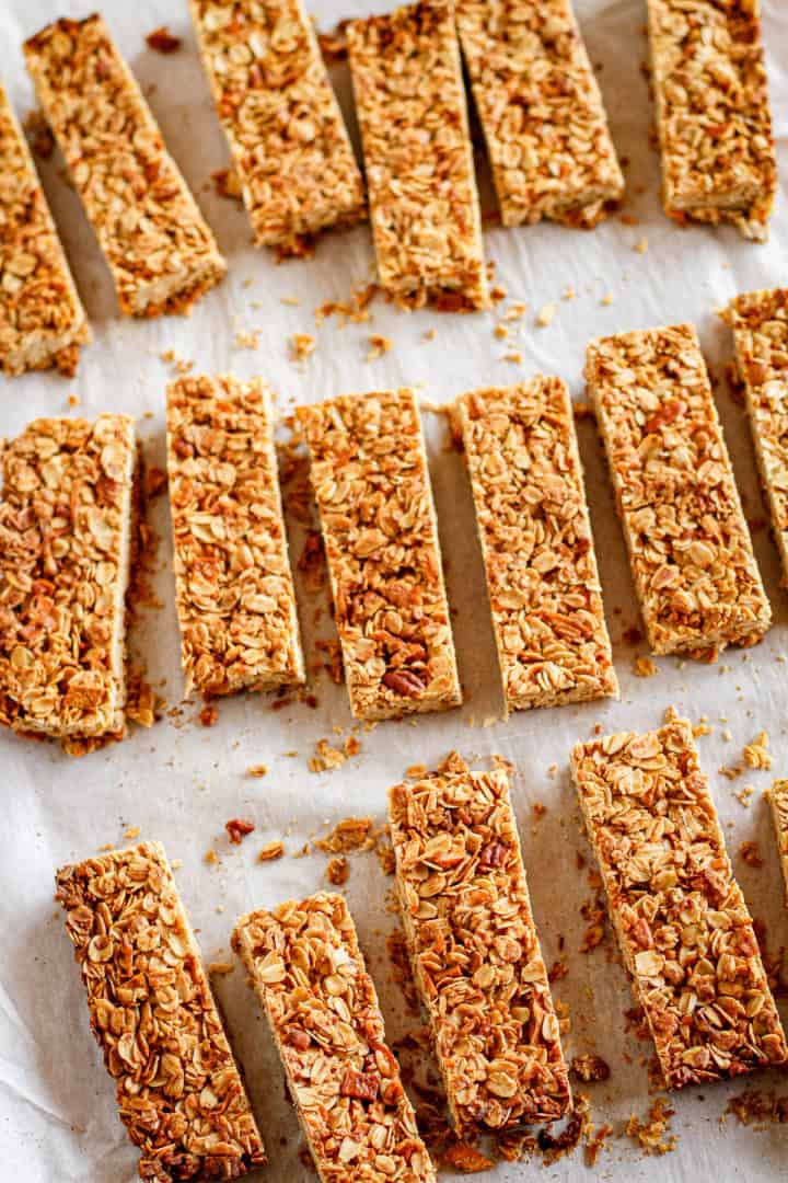 homemade crunchy granola bars on white parchment paper