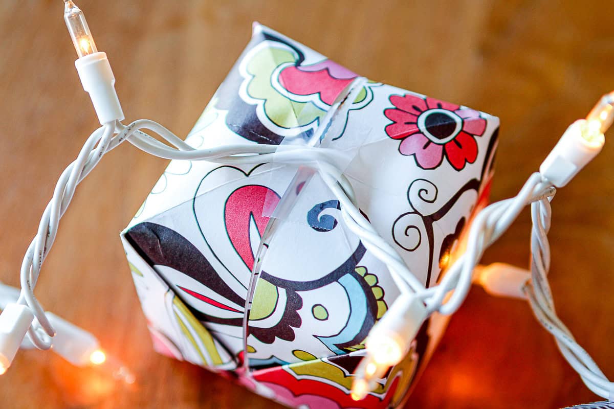 demonstrating how to make paper lanterns for origami lights