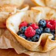 tortilla bowl filled with fresh raspberries and blueberries