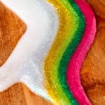 rainbow glitter slime recipe spread out on a table