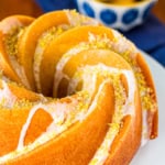 glazed lemon bundt cake infused with lemon syrup and sprinkled with lemon sugar