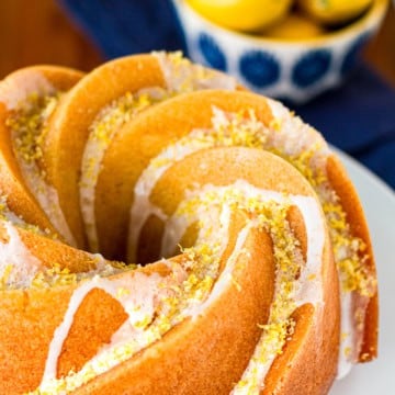 glazed lemon bundt cake infused with lemon syrup and sprinkled with lemon sugar