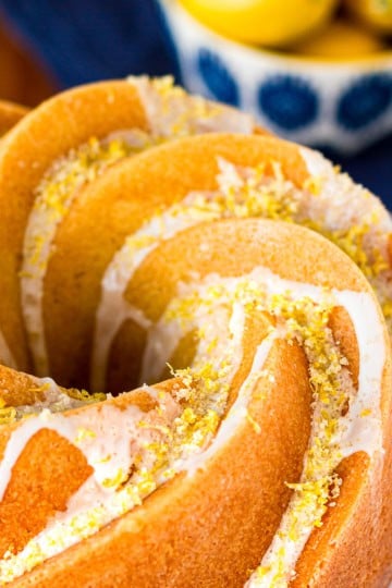glazed lemon bundt cake infused with lemon syrup and sprinkled with lemon sugar
