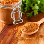 homemade taco seasoning all purpose spice mix in a jar with a measuring spoon