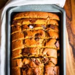 chocolate chip pumpkin bread sliced in a nonstick bread pan