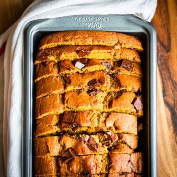 chocolate chip pumpkin bread sliced in a nonstick bread pan