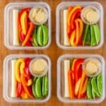 easy hummus snack idea with veggies in individual plastic containers