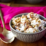 Creamy Grape Salad with Toasted Pecans -- it’s never the wrong time to bring this grape salad to a gathering! Plump, juicy grapes folded into a cool, creamy mixture of cream cheese and sour cream, all topped off with dark brown sugar and crunchy toasted pecans… | grape salad recipe | grape salad with cream cheese | grape salad with brown sugar | easy grape salad | find the recipe on unsophisticook.com