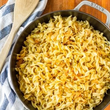 Hungarian fried cabbage and noodles recipe in a cast iron pan