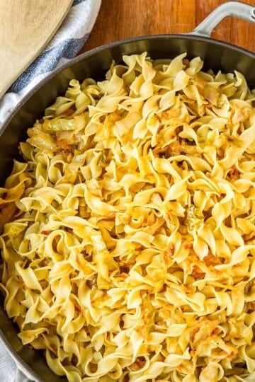 Hungarian fried cabbage and noodles recipe in a cast iron pan