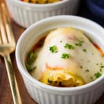 spinach lasagna roll ups in ceramic ramekins