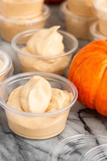 pumpkin pie pudding shots recipe in plastic cups with lids