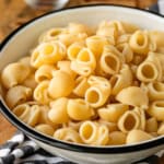 plain instant pot pasta recipe in a black and white enamelware bowl
