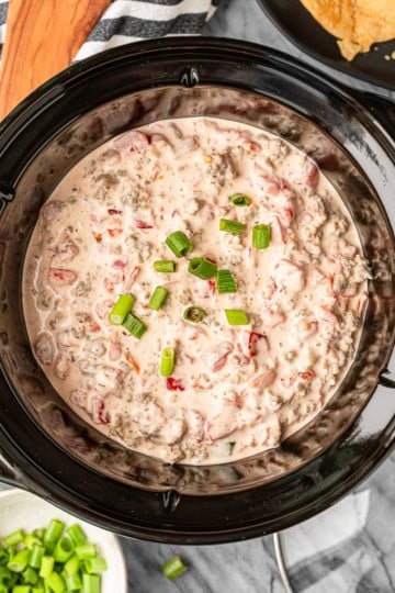 sausage dip recipe in a crockpot with tortilla chips