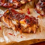 tender ribs with barbecue sauce on parchment paper