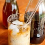 homemade iced coffee in a glass with a straw