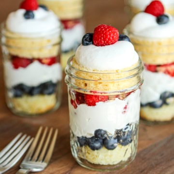 4th of july trifle with blueberries and raspberries in a mason jar