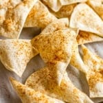 crispy flour tortilla chips dusted with chili powder