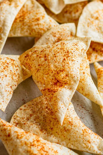 crispy flour tortilla chips dusted with chili powder