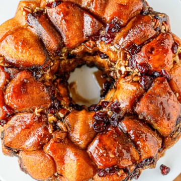 grands monkey bread on a white ceramic cake stand