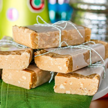 peanut butter fudge with marshmallow creme cut into blocks and wrapped with waxed paper