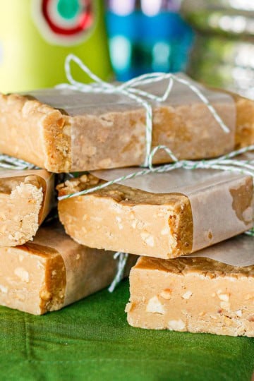 peanut butter fudge with marshmallow creme cut into blocks and wrapped with waxed paper