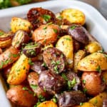 roasted ranch potatoes in a white enamel serving dish
